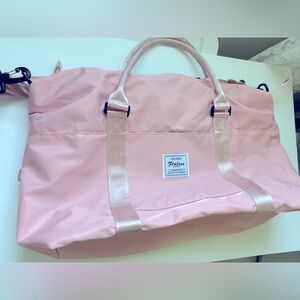 Pink duffle bag